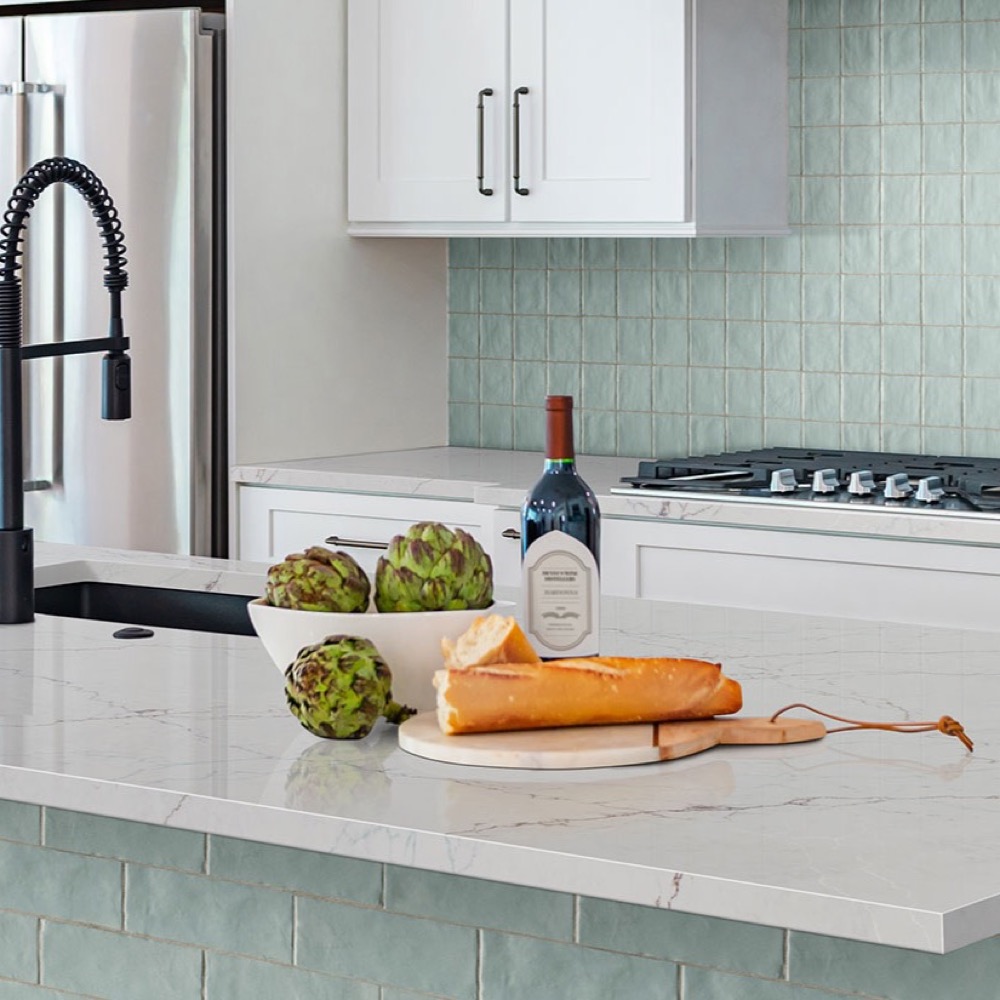 Calacatta Miraggio Seaglass quartz countertop in a kitchen
